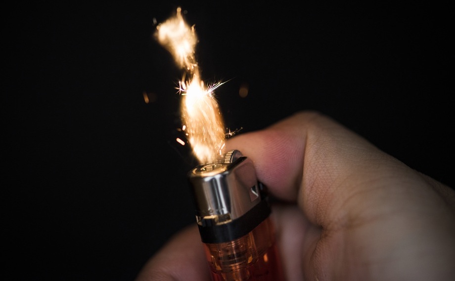 macro-shot-hand-holding-lighter-2.jpg